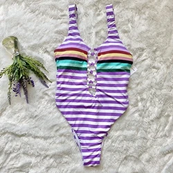 “Channel a retro 80s vibe in this playfully striped one-piece cut with high legs and a deeply scooped back. Strappy...