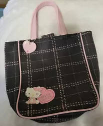 2003 Vintage Sanrio Hello Kitty Gray/Pink Plaid Bag.  Excellent condition.  Sturdy material and leather handles and...