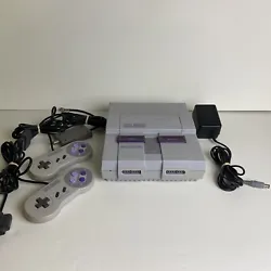 Super Nintendo SNES System Console + 2 OEM Controllers + Cables Authentic Works!Very good condition, works perfectly....