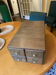 Antique card catalog with four drawers. Measures 23x14x10. It weighs 28 pounds. If you are interested in shipping let...