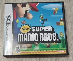 vends new super mario bros ds en complet bon etat. cest une version  anglaise ou us  ,mais le jeu fonctionne sur une...