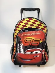 Disney Pixar Cars. “lightning McQueen”rolling backpack. 16”in. Main storage compartment also small zip up...