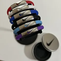 One size fits all. Bracelet is made of high quality silicone/elastic rubber and a stainless steel clasp. Swoosh logo on...