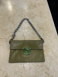 Authentic PRADA Italy Silver Chain Clutch Hand Bag Purse. Buttery Leather in a medium green. The hardware is sliver...