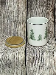 Add a touch of nature to your kitchen with these beautiful ceramic canisters. It has a cylindrical shape with an oak...