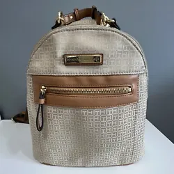 Tommy Hilfiger Mini Backpack. Pre-owner has some flaws (see photos for more details)