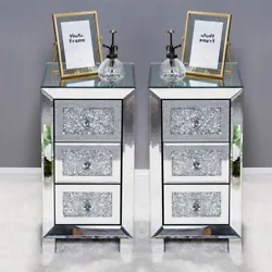This unique mirrored nightstand or bedside table with three drawers is sure to add sparkle to your bedroom. Crystal...