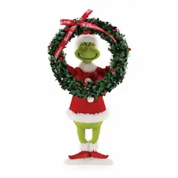 He holds a large wreath to decorate Whoville. The Clothtique fabrics bring a unique realism to each design.
