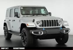 This ALL NEW 2024 Jeep Wrangler Sahara 4xe features the silver zynith clear coat exterior and black mckinley trimmed...