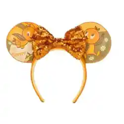 Youll enjoy orange ears to go with your green thumb while wearing this souvenir ear headband from the EPCOT...