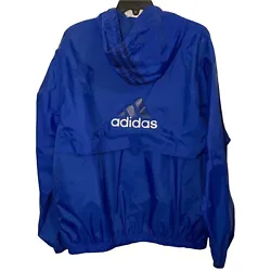 Pre-OwnedPaint Stains (pictured)Vintage 90s Adidas Hooded Windbreaker JacketRoyal Blue / Navy Blue / WhiteThree Stripes...