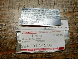 Here is a new genuine Porsche A/C freon decal 964.701.141.02 as used on 1995-98 911/993 models. Unit has a few...