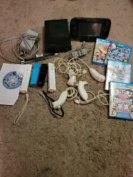 Nintendo Wii U Console Bundle With 5 Games And 4 Controllers With Nunchucks. Games included are: Nintendo Land (No...