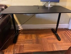 Height adjustable desk. Easy to assemble (instructions included).