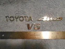 OEM TOYOTA TAILGATE/LIFTGATE EMBLEMS. NOT GOLD IN COLOR OR FINISH.