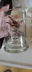 This vintage Avon tankard mug stein is a classic piece of barware that any wildlife lover would appreciate. The clear...