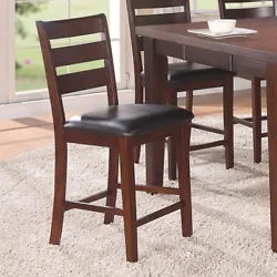 Define a bold presence with this counter height dining room set with seating for upto six. This set includes four...