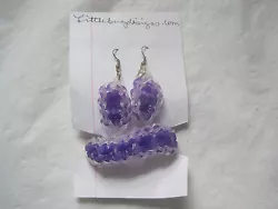 This is a new Purple and Clear hand woven bracelet and earrings set. It is made of Rainbow Loom Rubber Bands with fish...