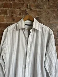Very nice mens fitted shirt from Gucci, Tom Ford era. Enjoy!Excellent condition.Sz 15.5/39: 23” armpit to armpit,...