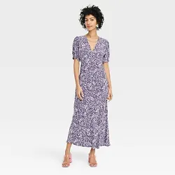 •Printed short-sleeve midi dress •Made from crepe fabric •Features short puff sleeves •V-neckline •Side...