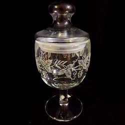 With 3D clear protective cases (FIGPINS) Collectibles. The clear glass pedestal compote features an intricate etched...