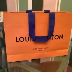 Authentic gift bag.  Never re-used. Received with gift certificate and then packed away.