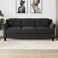 The Lifestyle Solutions Taryn Rolled Arm Sofa upholstered in dark gray fabric is the three seat option of this...