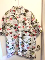 This is an UZZI Amphibious Camp Hawaiian shirt done with a white background and red hibiscus flowers with palm trees...