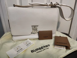 Authentic Burberry TB Shoulder Bag White Leather. The price is over $1,000. My boyfriend bought it from Bloomingdale...