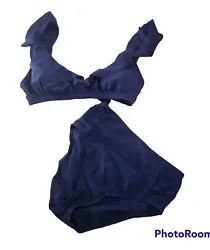 BCBG Paris 2 piece navy blue 2 piece swimsuitSize MediumThe top has ruffled top, straps are adjustableThe bottoms are...