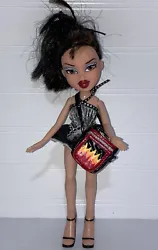 2001 MGA Bratz doll. Good Condition.. This 2001 Bratz doll is in good condition. She does have a yellow mark and a few...