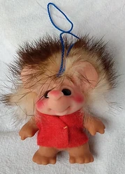 Troll doll is in excellent condition for its age, however one finger is flawed - see photos.