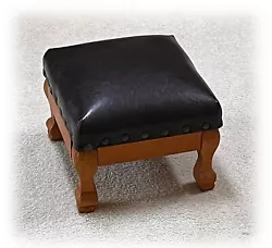 This is a wonderful little, square footstool that would be perfect for a den, great room, family room, bedroom or man...