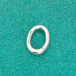 Authentic Tiffany & Co Oval Jump Ring in New Condition. Where do we get all our Tiffany & Co Pieces???.