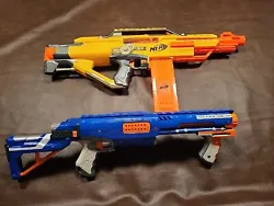 Two NERF DART Guns, a STAMPEDE ECS and a RAIDER CS-35 with cartridges and attachments shown in pictures included. Both...