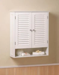 Perfect for you compact bathroom or kitchen. Add storage space to any wall with this lovely wood cabinet. It features a...