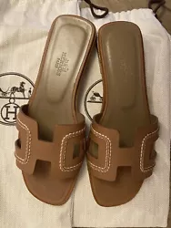 Hermes Oran Gold (Tan) sandals sz 36.5 - WITH DUST BAGS AND BOX. Never worn outside of the house.100% authentic