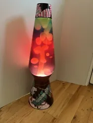 27” hand painted Alice in Wonderland lava lamp. Brand new- only turned on for pictures to show it’s working and not...