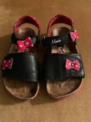 Girls Minnie Mouse Sandals, black with red bows. Girls size 12. Minnie Mouse is on the instep.