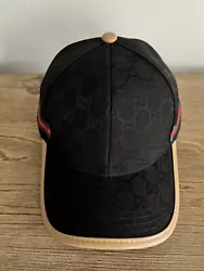 Gucci hat. Black baseball cap, tan leather trim brim Velcro adjustable strap, size medium excellent condition, no signs...