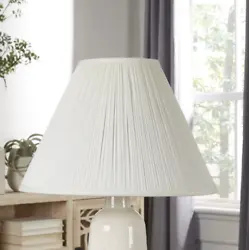 This Empire Style Table Shade is a quality product that features a soft off-white color with a pleated design that...
