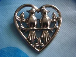 The pin is made with an early C clasp, and there is a stamp on the birds tail underneath 