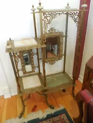This ornate stand is in very good condition. This is an estate find from a beautiful estate located in Roxbury, CT....