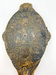 Art Nouveau style. Ornate brass hand mirror with cherub/angel motif. The glass is good and the mirror itself feels...