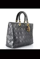 Christian Dior Lady Dior Bag Cannage Black. CONDITION:- creasing and flattening to shape; markings,stains, and...