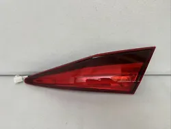 Up for sale is a good working part. It is a right passengers side inner LED tail light. This is a genuine authentic OEM...