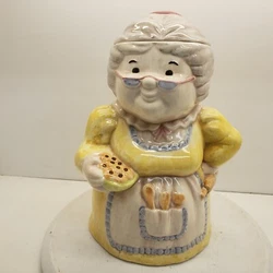 Treasure Craft Granny With Cookies Cookie Jar Yellow Dress. This jar is great shape. It has two small chips on bottom...