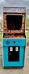 On the inside of the cabinet, the original guts are intact, all but the Donkey Kong dedicated PCB. I have an original...