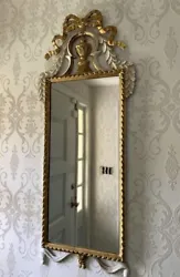 Made in Italy. Hollywood Regency Mid 20th Century. Carved Wood Gilt Wall Mirror. Wood is Gilt and Painted White.