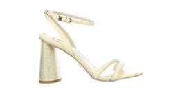 Delicate straps frame this alluring, sky-high sandal thats party-ready with a flirty buckle closure at the ankle. 4...